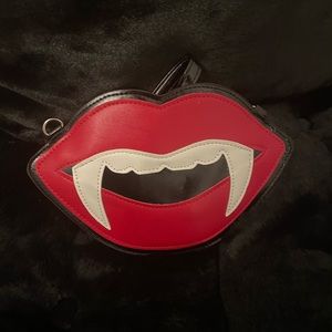 fang purse with cross body strap